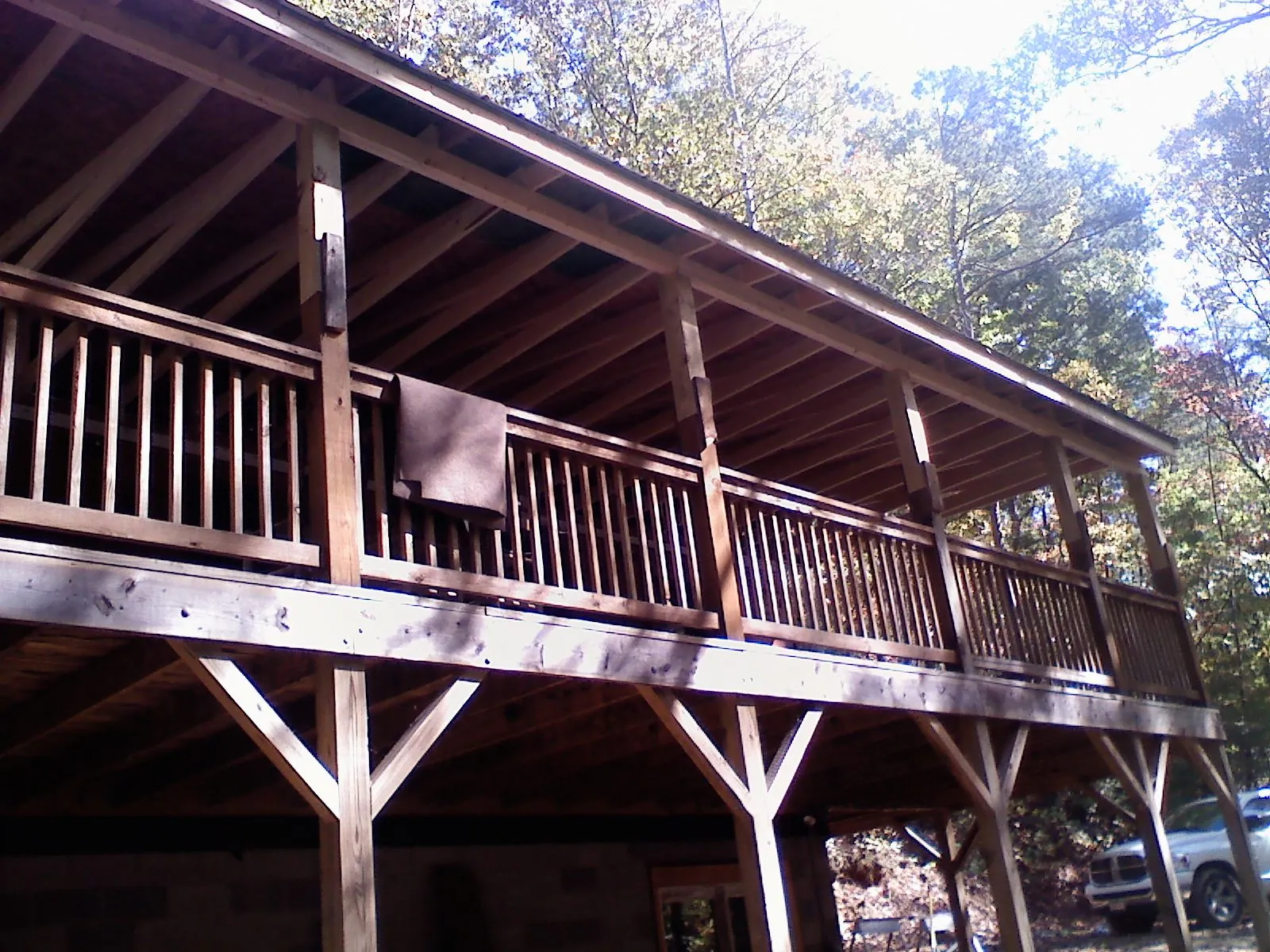 Timber framing under a new elevated porch and deck — Roof Leak Repair in Sardinia by Roofing Brothers